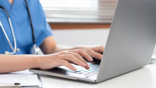 Veterinarian Working on a laptop computer
